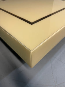 1970s Acrylic Stepped Cream Colored Coffee Table with Brass Ribbon Inlay
