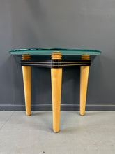 Load image into Gallery viewer, 1990 demi-lune hall table designed by Kaiser Newman, featuring a curved green glass top, light beech wood legs, and a black lacquered frame with white inlay detailing