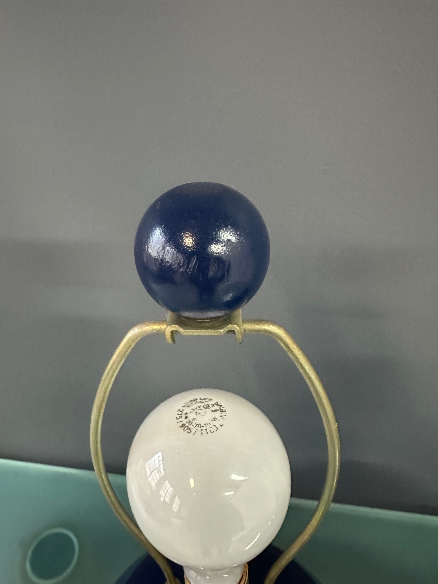 Pair of Mid-Century Mar-Kel Lighting Table Lamps Featuring Deep Blue Spherical Glazed Ceramic Bases with Brass Hardware and Harps