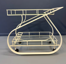 Load image into Gallery viewer, Vintage 1980s postmodern two-tier bar cart with curvy metal frame and glass shelves, attributed to Woodard