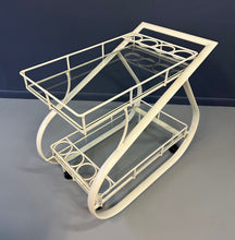 Load image into Gallery viewer, Vintage 1980s postmodern two-tier bar cart with curvy metal frame and glass shelves, attributed to Woodard