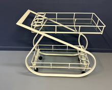 Load image into Gallery viewer, Vintage 1980s postmodern two-tier bar cart with curvy metal frame and glass shelves, attributed to Woodard