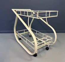 Load image into Gallery viewer, Vintage 1980s postmodern two-tier bar cart with curvy metal frame and glass shelves, attributed to Woodard