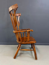 Load image into Gallery viewer, Grand Windsor chair designed by Herman de Vries for The Sikes Company, featuring curved crest rail, vertical spindle back, and contoured wooden seat