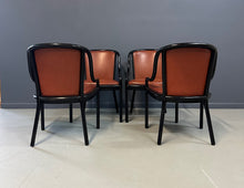 Load image into Gallery viewer, Set of four rare 1970s Ward Bennett Landmark Variation chairs for Brickel Associates, featuring black lacquered frames and rust leather upholstery—mid-century modern design
