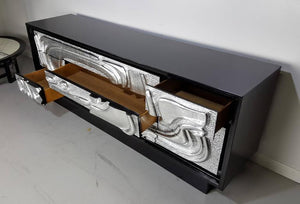 Sculptural Ebonized Credenza with Silver Leafed Front