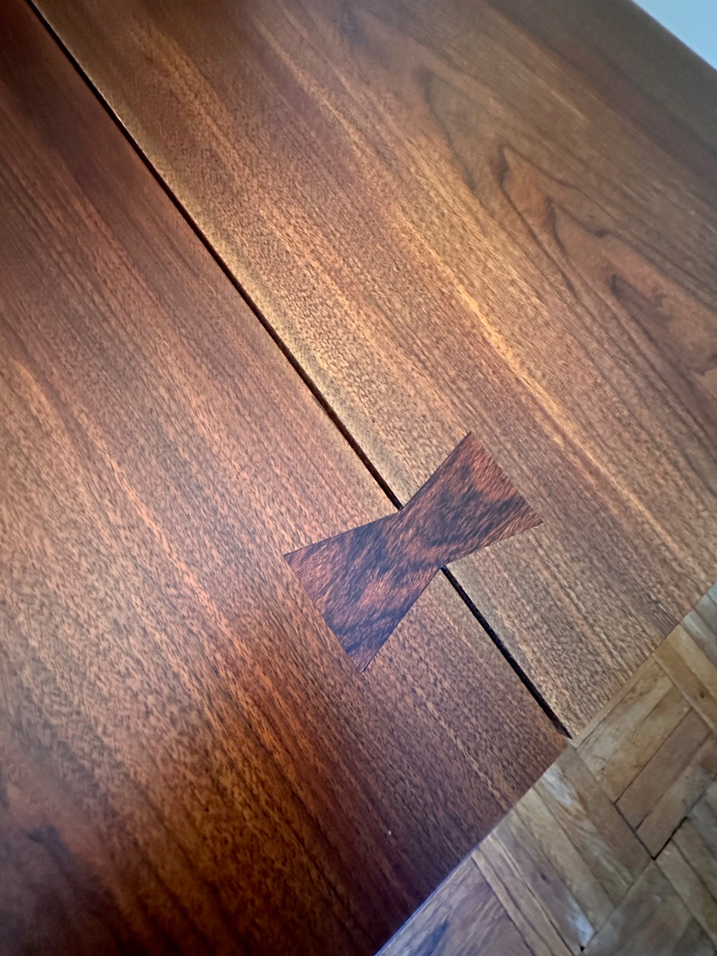 SOLD – George Nakashima 8' Dining Table in Bookmatched Walnut with 5 Rosewood Butterfly