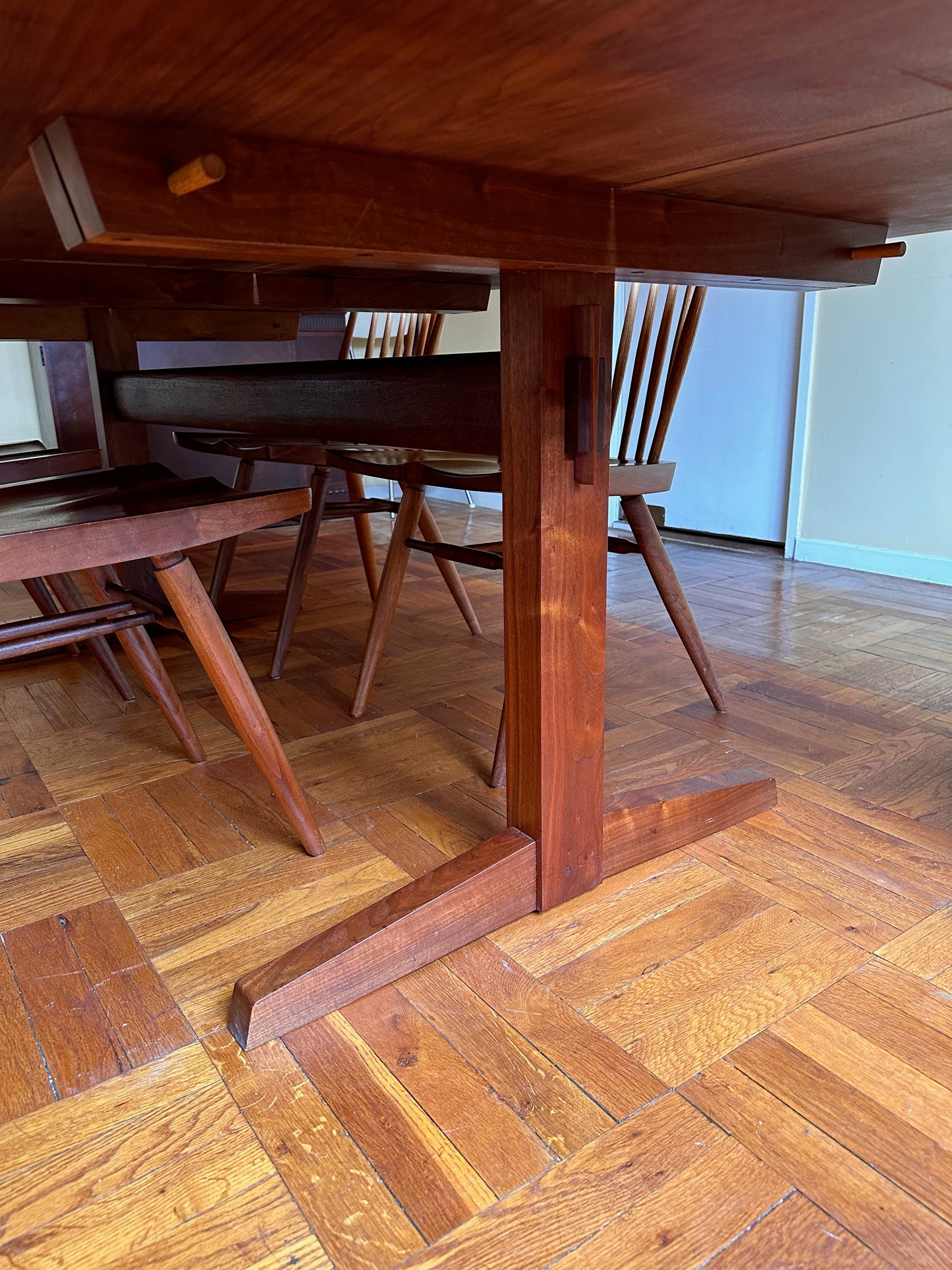 SOLD – George Nakashima 8' Dining Table in Bookmatched Walnut with 5 Rosewood Butterfly