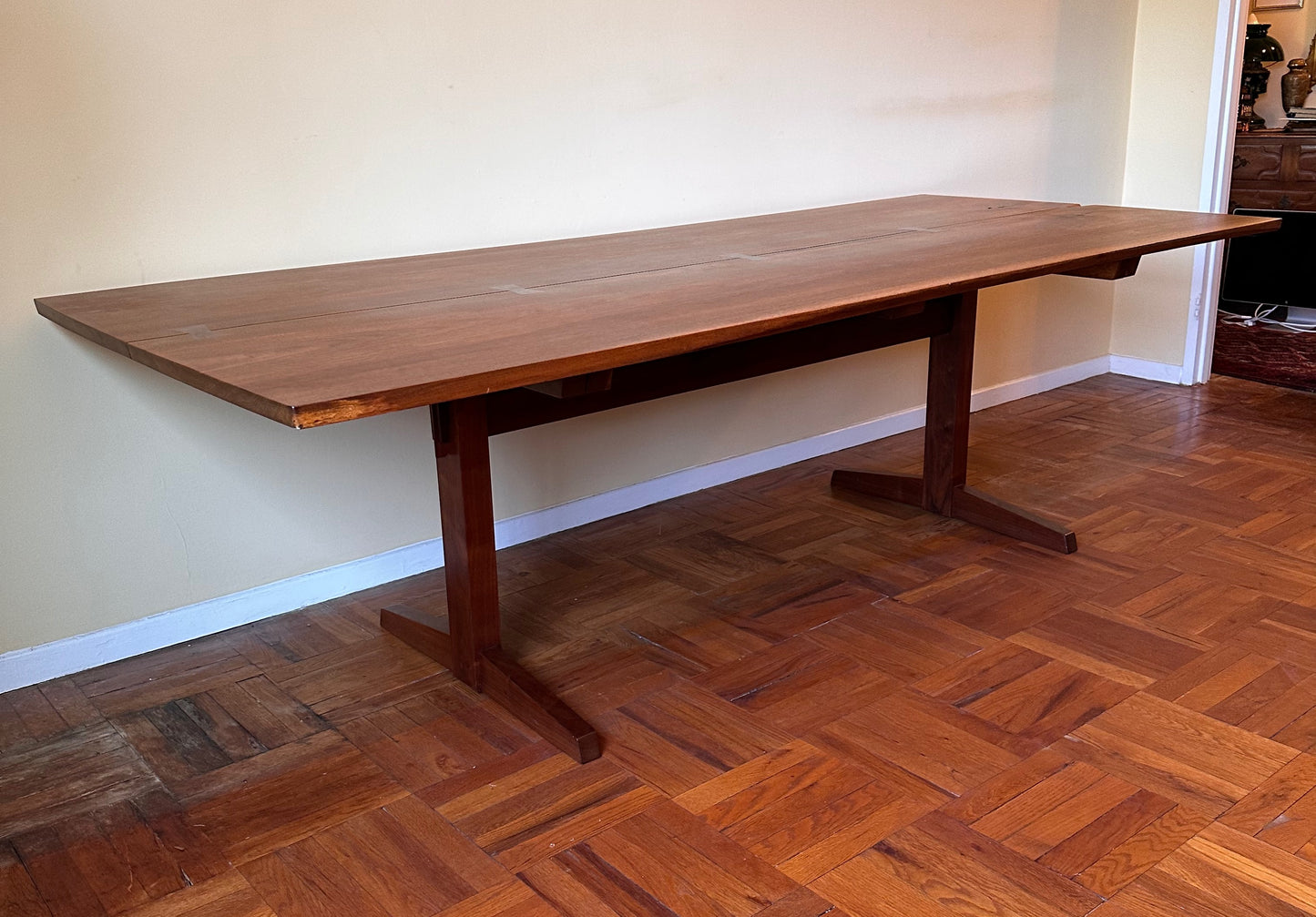 SOLD – George Nakashima 8' Dining Table in Bookmatched Walnut with 5 Rosewood Butterfly