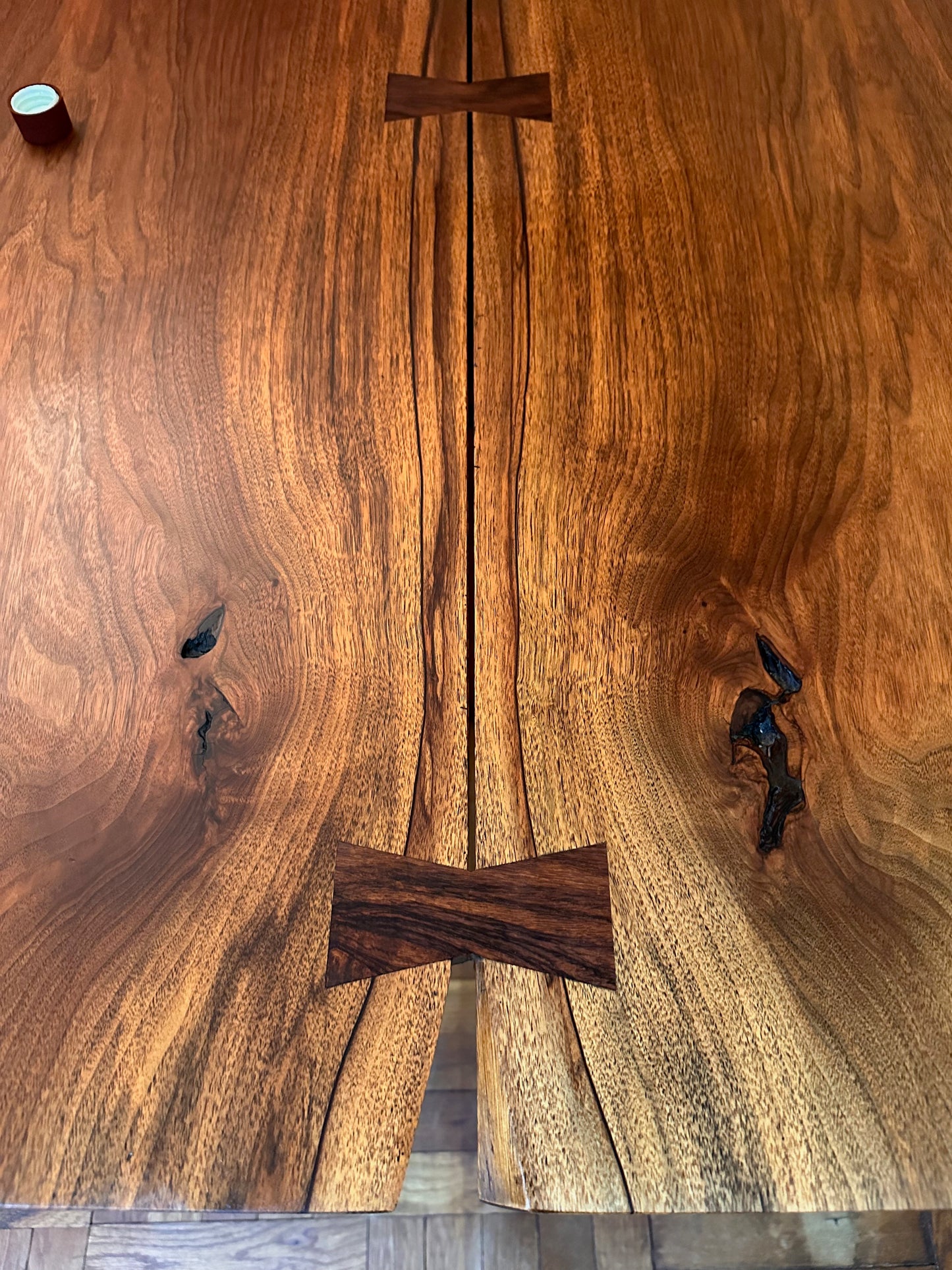 SOLD – George Nakashima 8' Dining Table in Bookmatched Walnut with 5 Rosewood Butterfly
