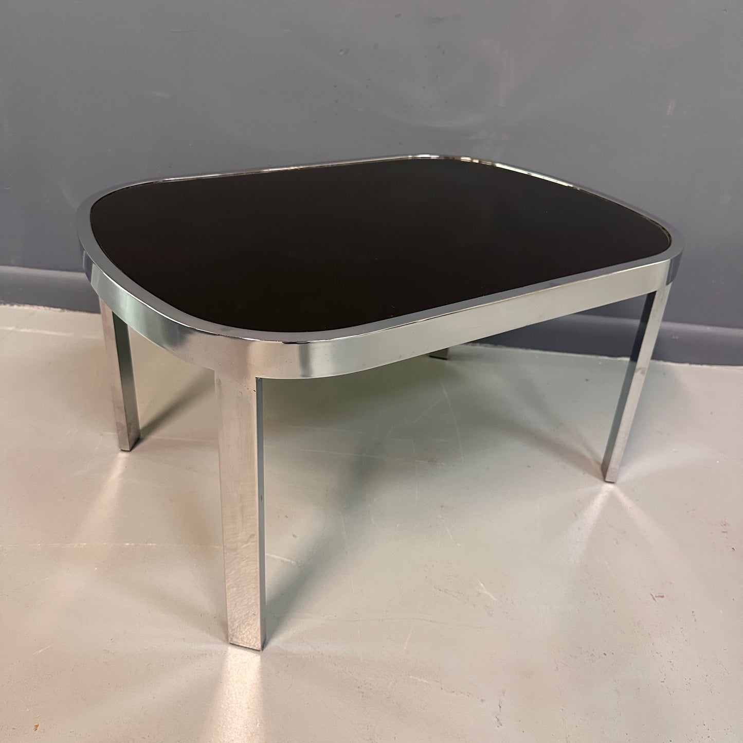SOLD – Milo Baughman Black Glass Racetrack Side Table for Design Institute of America