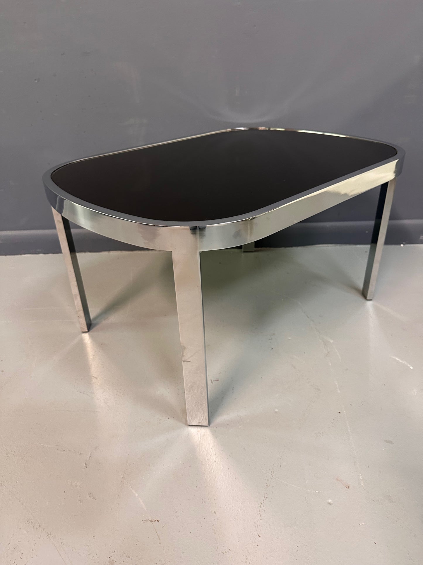 SOLD – Milo Baughman Black Glass Racetrack Side Table for Design Institute of America