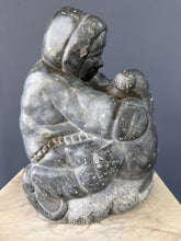 Load image into Gallery viewer, Inuit Hunter with Seal – Canadian Arctic Soapstone Sculpture