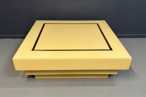 1970s Acrylic Stepped Cream Colored Coffee Table with Brass Ribbon Inlay