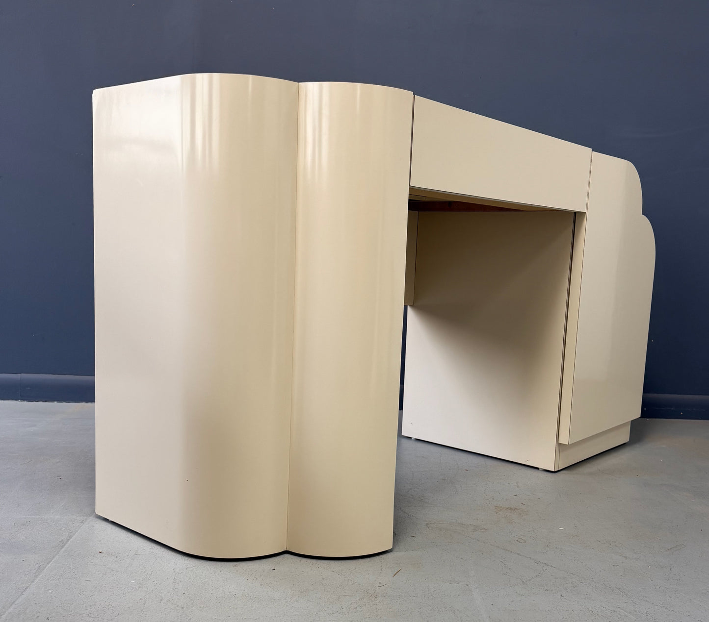 Postmodern Sculptural Cream Laminate Writing Desk with Waterfall Base, 1990s