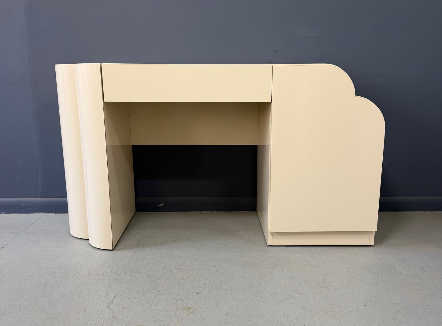 Postmodern Sculptural Cream Laminate Writing Desk with Waterfall Base, 1990s
