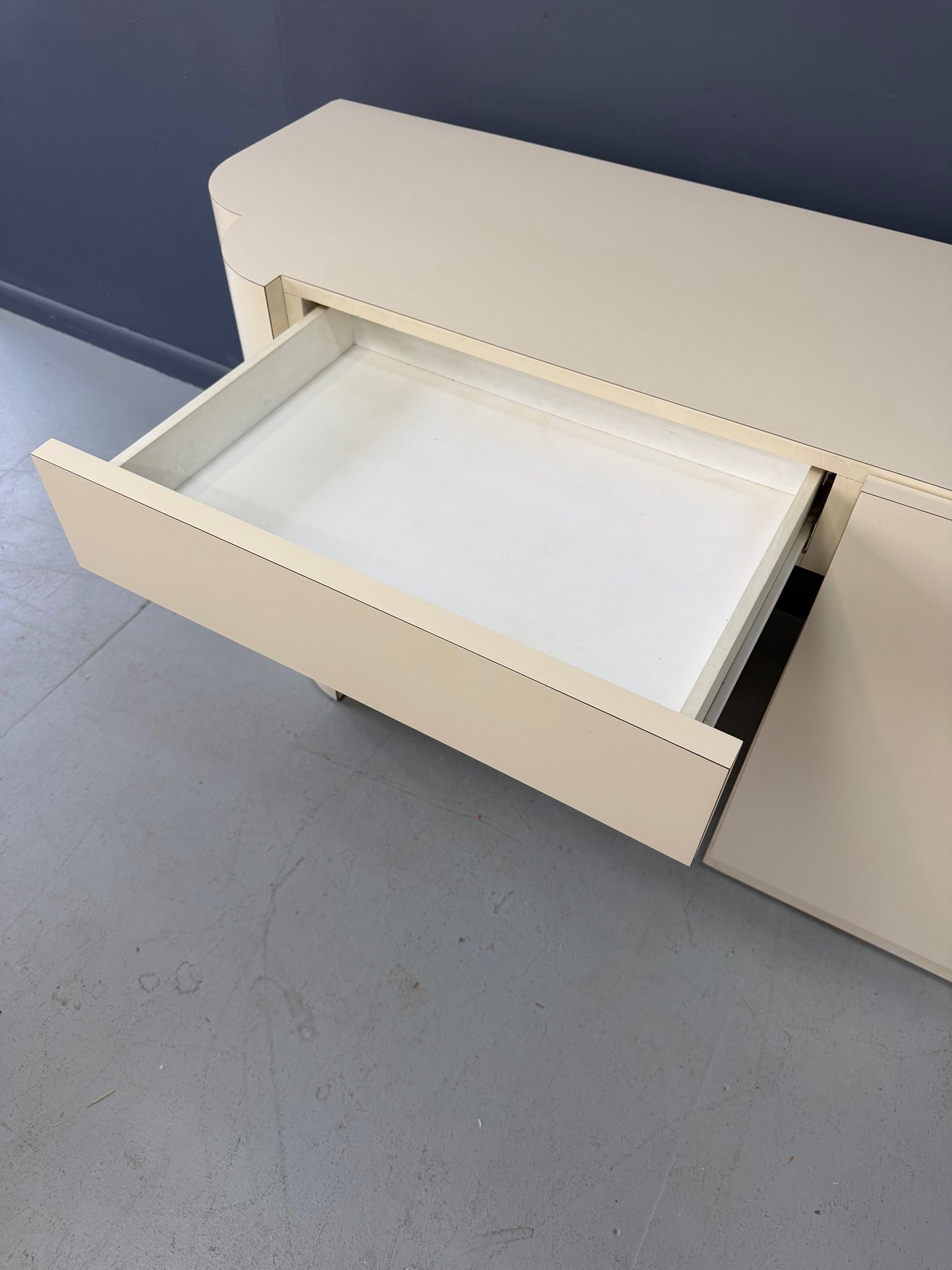 Postmodern Sculptural Cream Laminate Writing Desk with Waterfall Base, 1990s