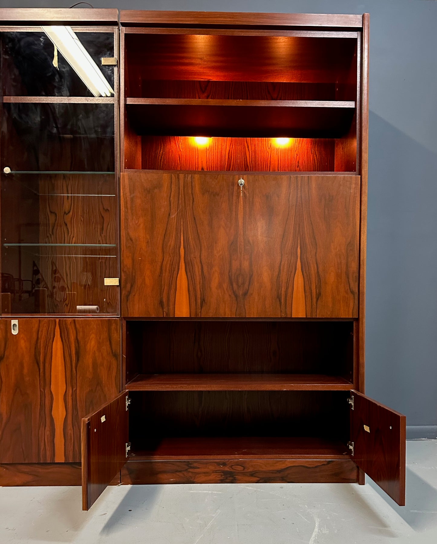 SOLD – 1970s Planum Rosewood and Mahogany Lighted Wall Unit with Desk Mid Century
