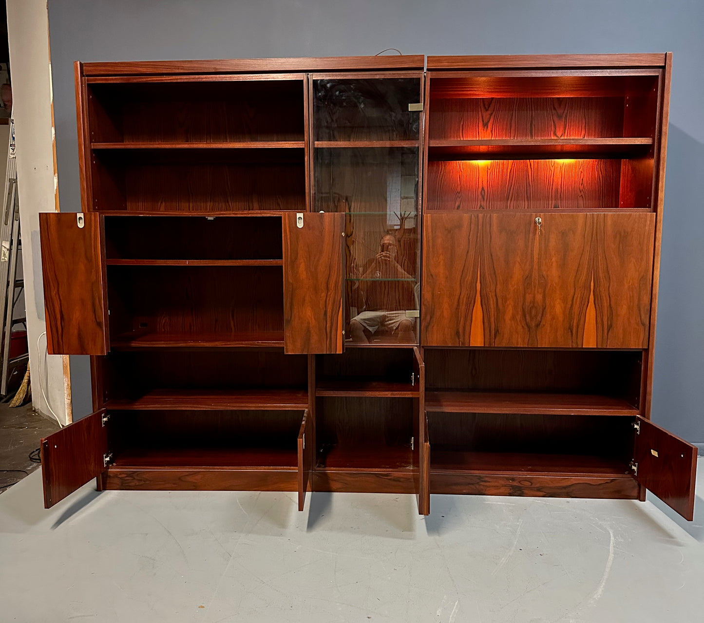 SOLD – 1970s Planum Rosewood and Mahogany Lighted Wall Unit with Desk Mid Century