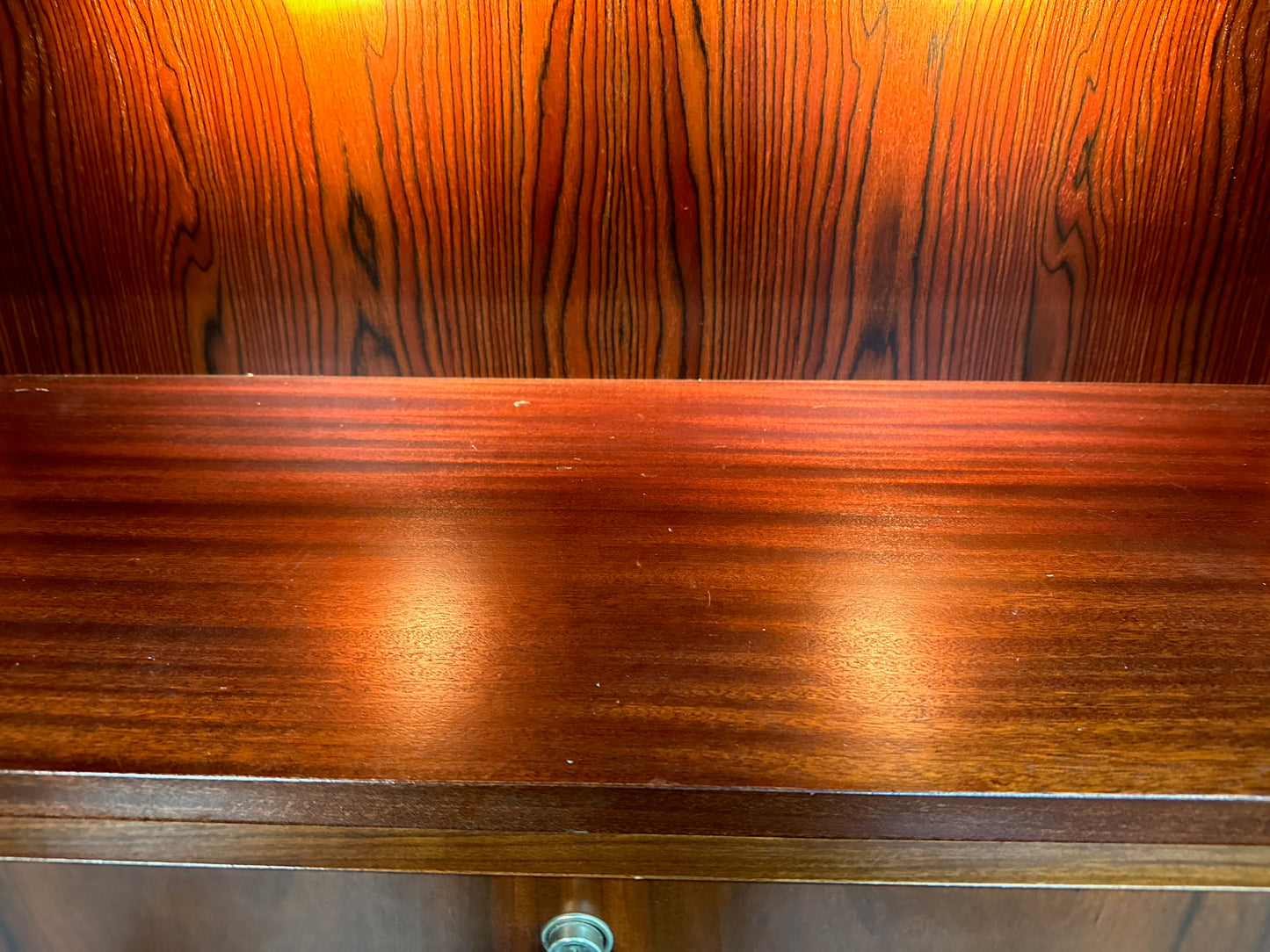 SOLD – 1970s Planum Rosewood and Mahogany Lighted Wall Unit with Desk Mid Century