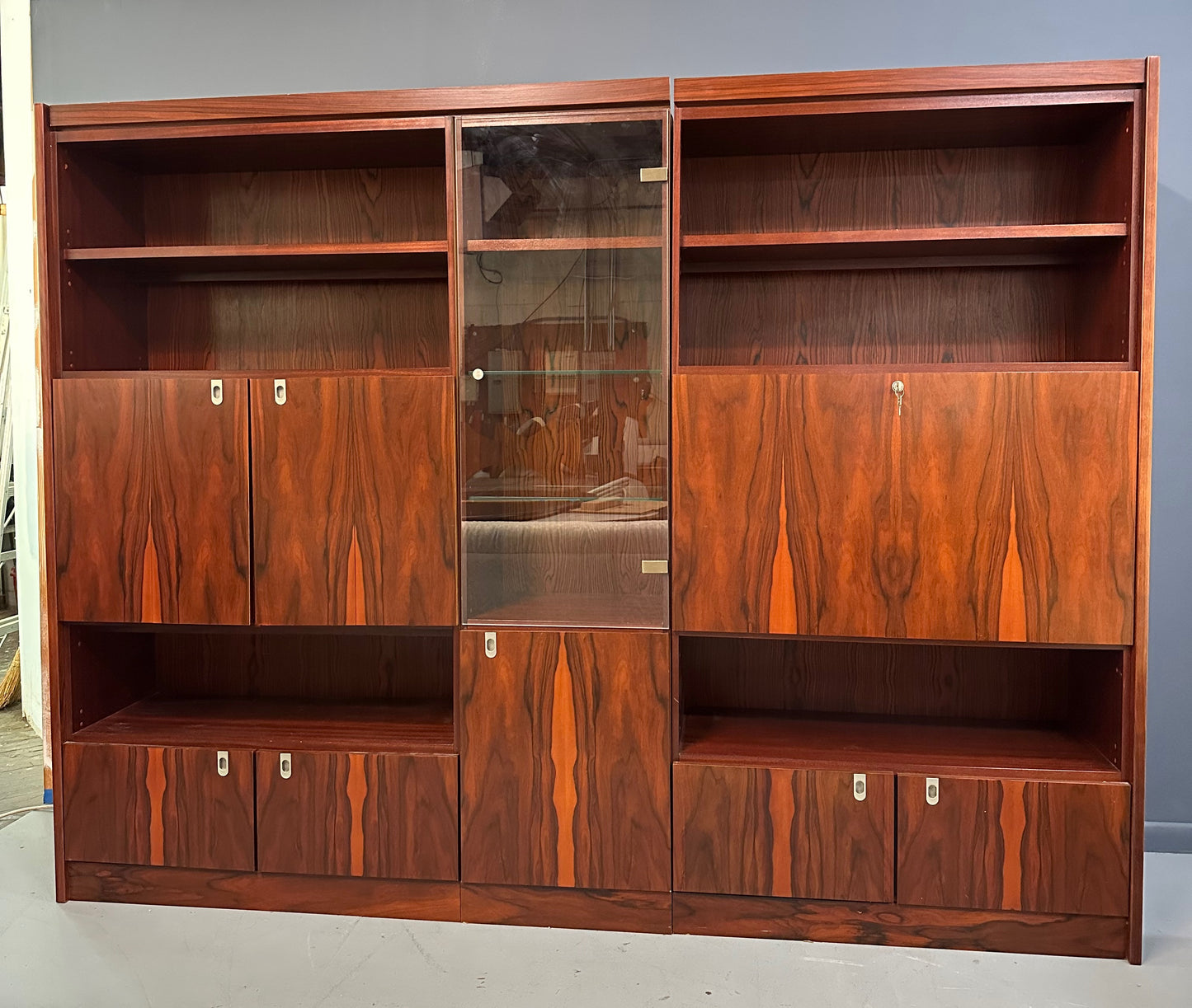 SOLD – 1970s Planum Rosewood and Mahogany Lighted Wall Unit with Desk Mid Century