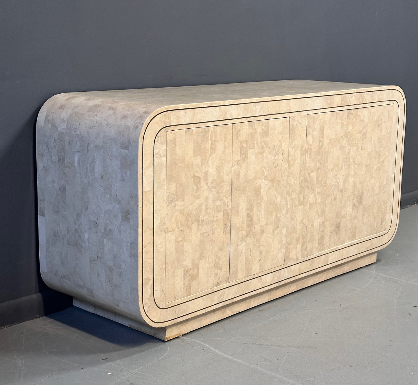 SOLD – Maitland Smith 1980s Tessellated Stone Rounded Credenza with Brass Detailing