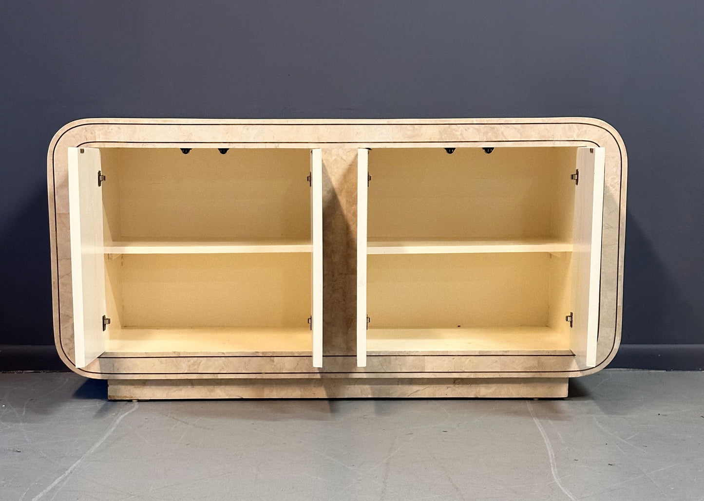 SOLD – Maitland Smith 1980s Tessellated Stone Rounded Credenza with Brass Detailing