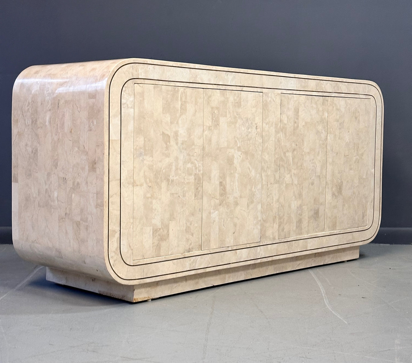 SOLD – Maitland Smith 1980s Tessellated Stone Rounded Credenza with Brass Detailing