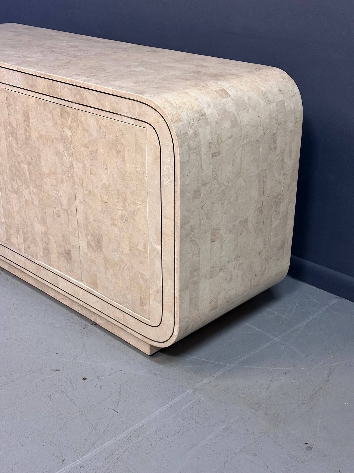 SOLD – Maitland Smith 1980s Tessellated Stone Rounded Credenza with Brass Detailing