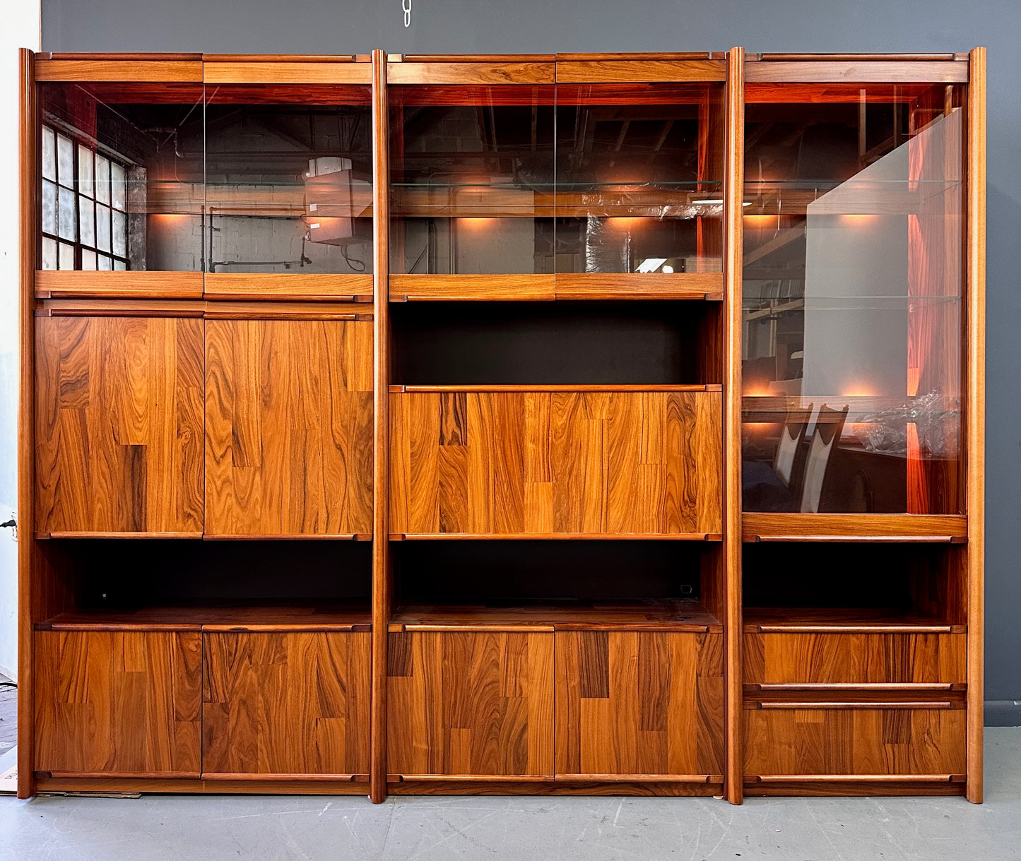 SOLD – 1980s Three Piece Lighted Rosewood Veneer Wall Unit the Style of Jorge Zalszupin