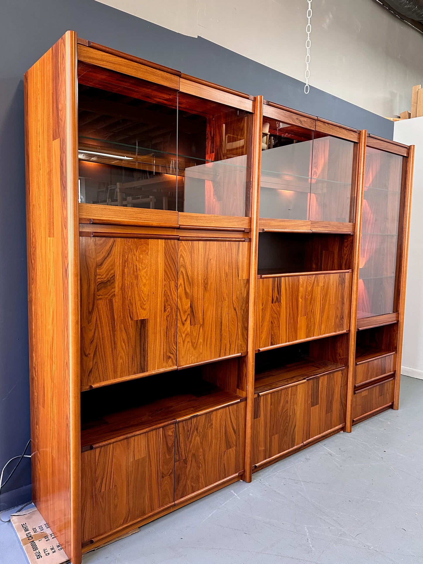 SOLD – 1980s Three Piece Lighted Rosewood Veneer Wall Unit the Style of Jorge Zalszupin