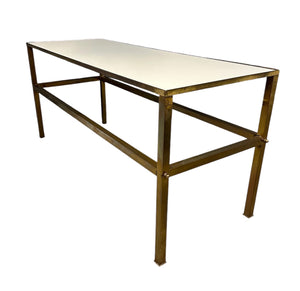 1970s brass console table featuring a sleek white Vitrolite glass top and a minimalist rectangular brass frame with clean lines and mid-century modern influence