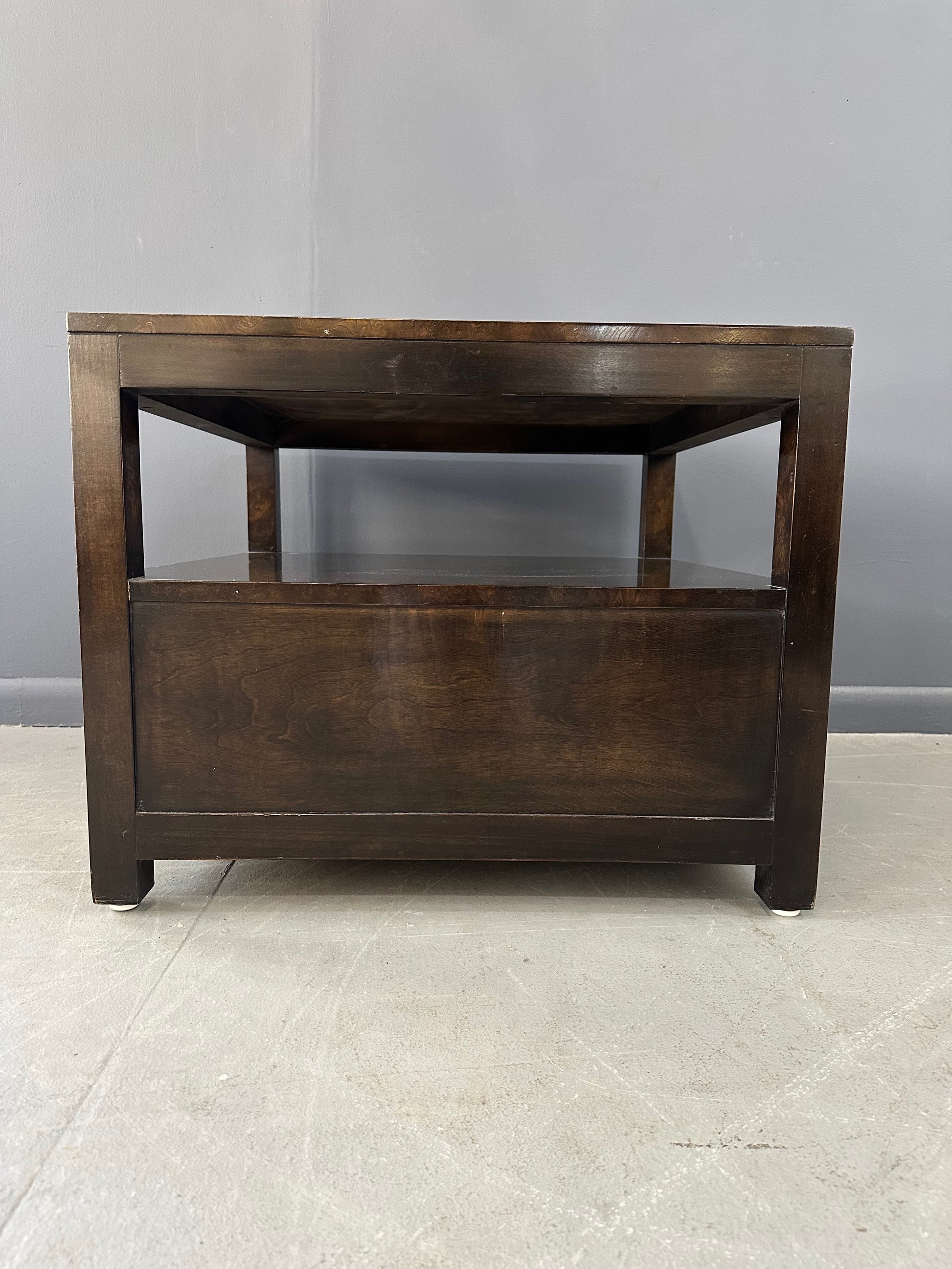 Large Mastercraft end table or nightstand featuring rich burl elm wood, brass trim, open shelving, and a drawer with geometric brass pulls