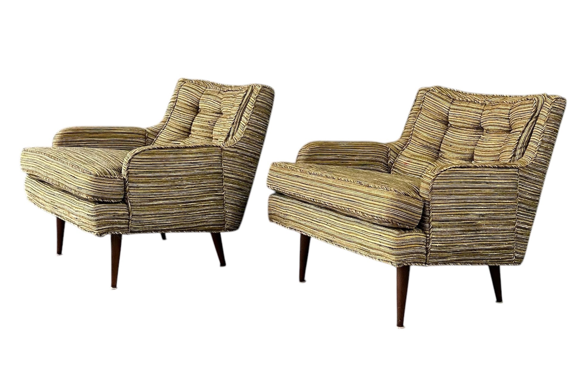Pair of mid-century lounge chairs with tapered walnut legs, upholstered in original striped multicolor fabric with tufted backs and plush cushions