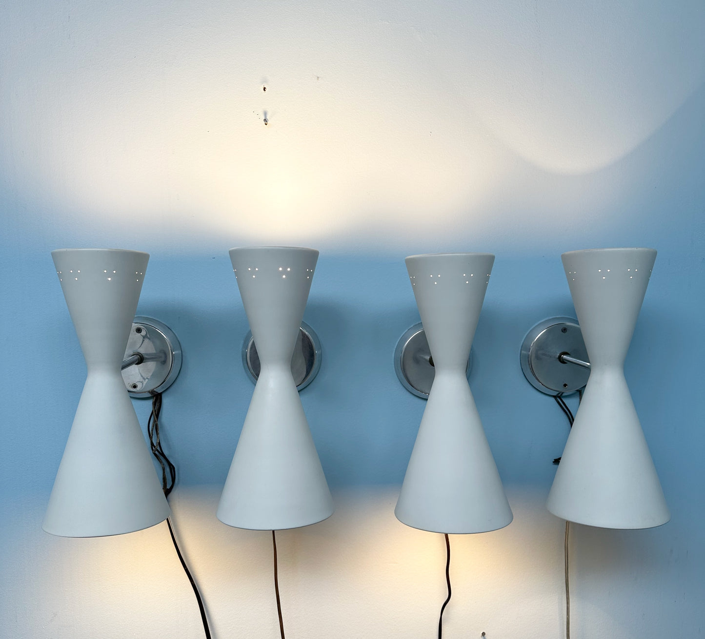 SOLD – Set of Four Litecraft Mid Century Sconces in White and Chrome with Pinhole Design