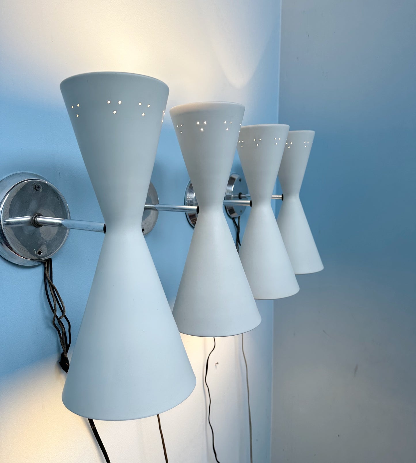 SOLD – Set of Four Litecraft Mid Century Sconces in White and Chrome with Pinhole Design