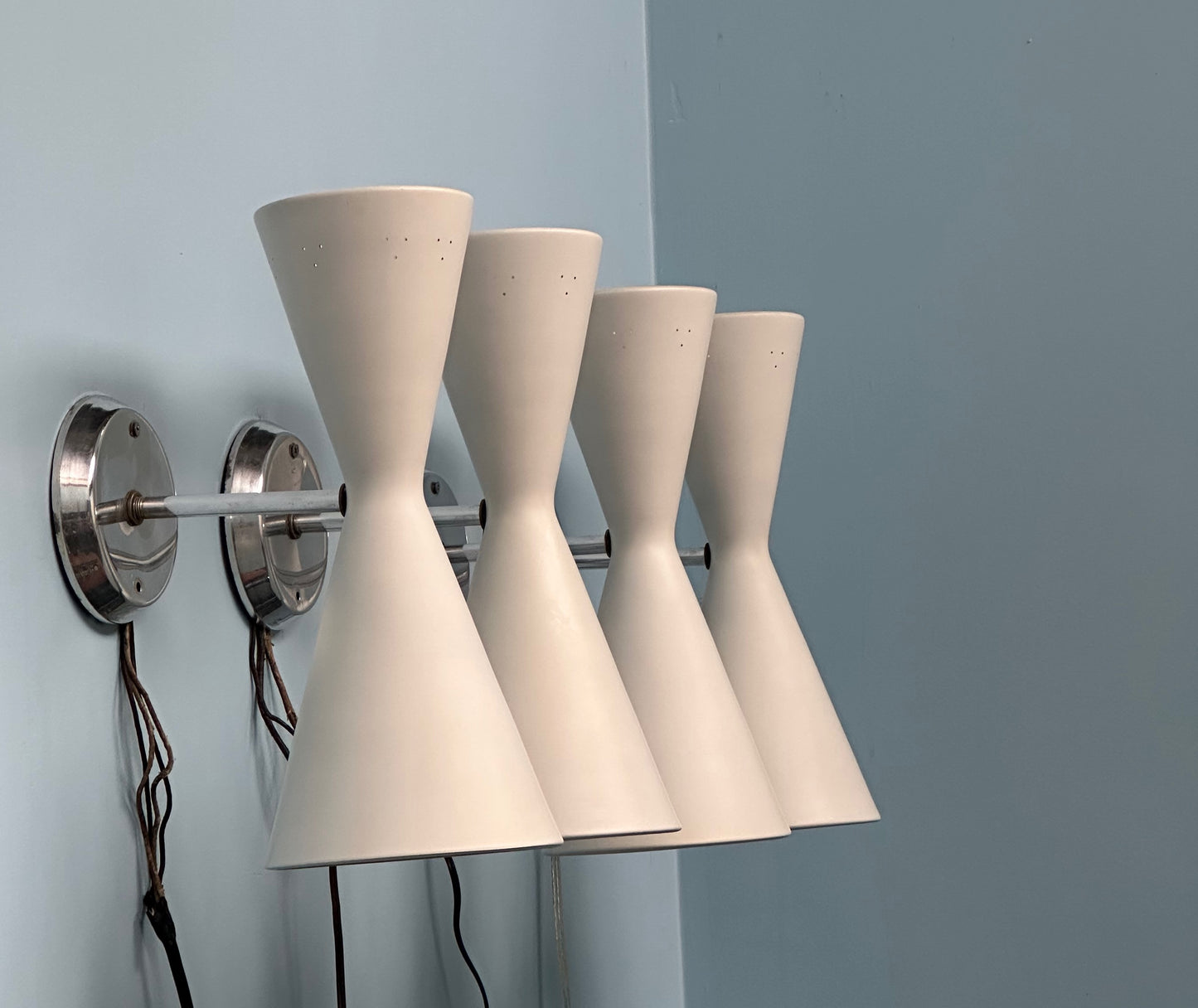 SOLD – Set of Four Litecraft Mid Century Sconces in White and Chrome with Pinhole Design