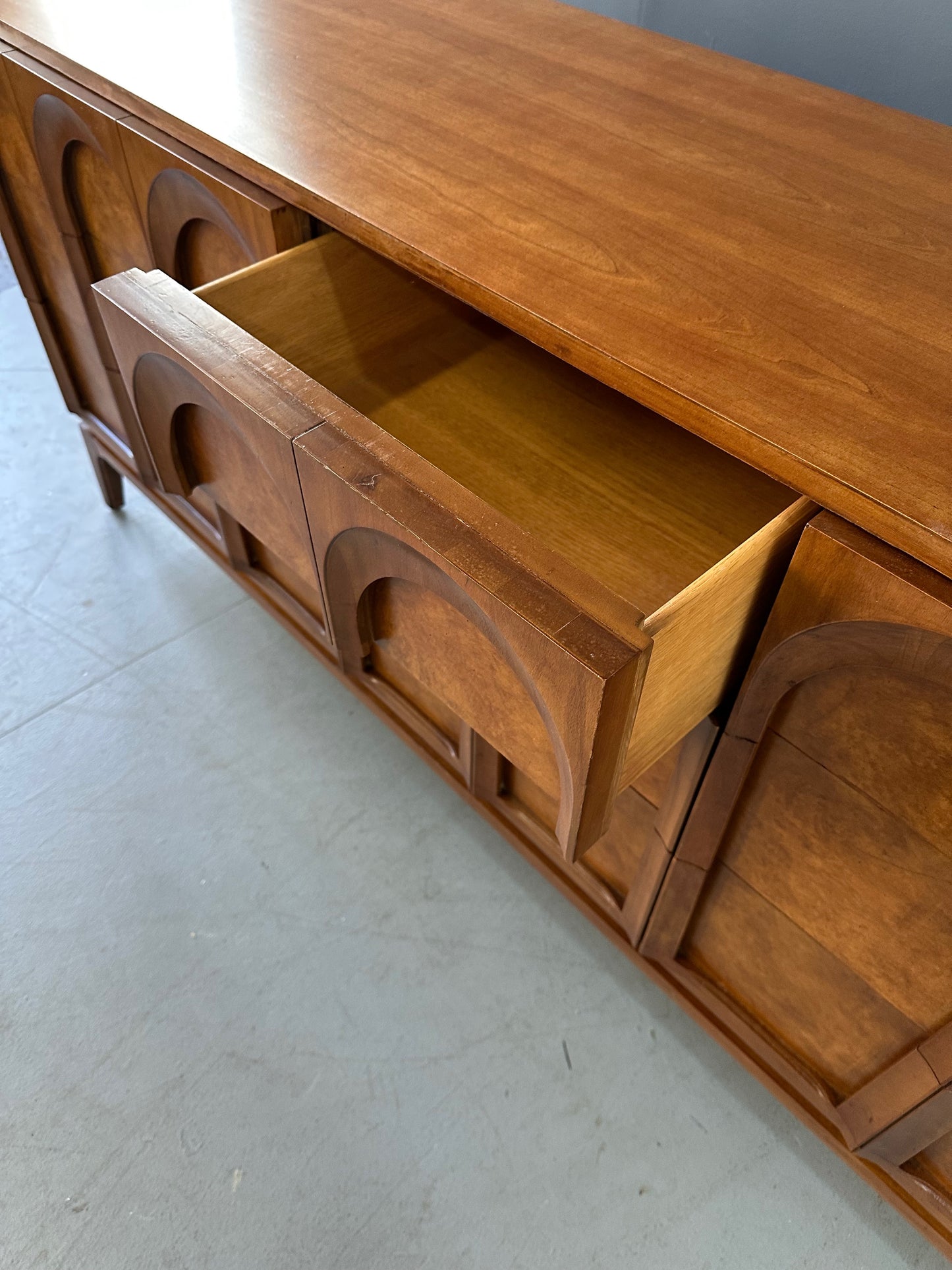 SOLD – Thomasville Sculptural 'Arched' 9 Drawer Dresser Walnut, Olive Burl
