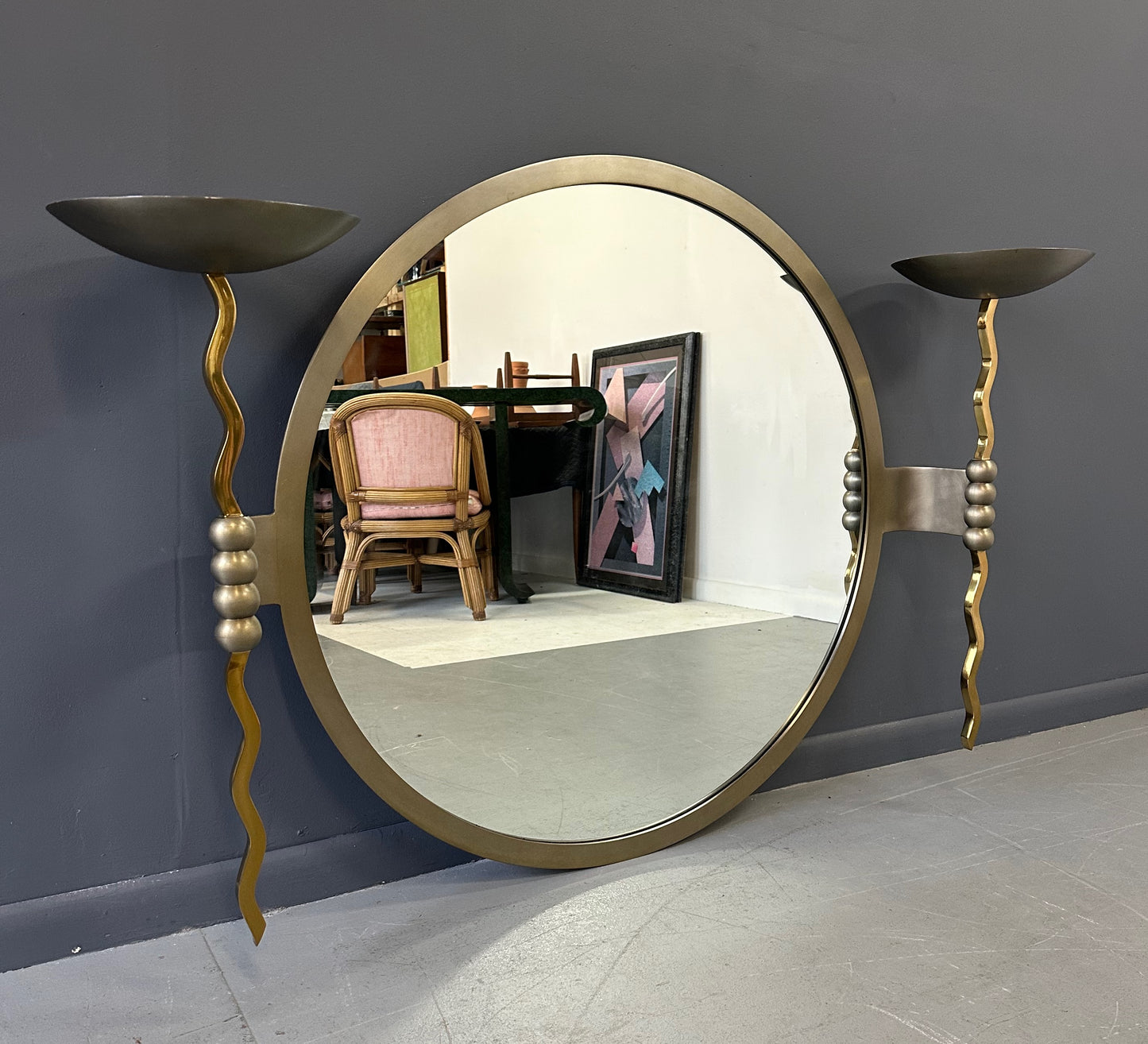 Brueton Large Postmodern 'Fist' Mirror Designed by Stanley Jay Friedman, Featuring Round Mirror with Sculptural Brass Candle Sconces