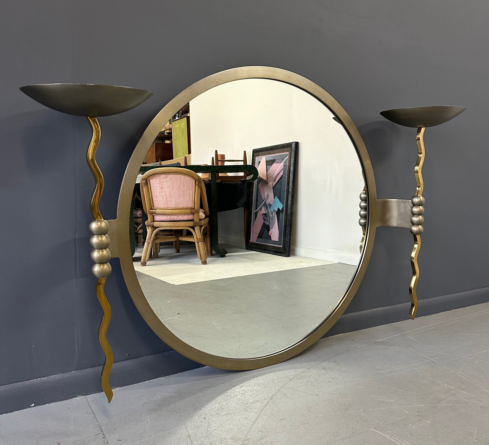 Brueton Large Postmodern 'Fist' Mirror Designed by Stanley Jay Friedman, Featuring Round Mirror with Sculptural Brass Candle Sconces
