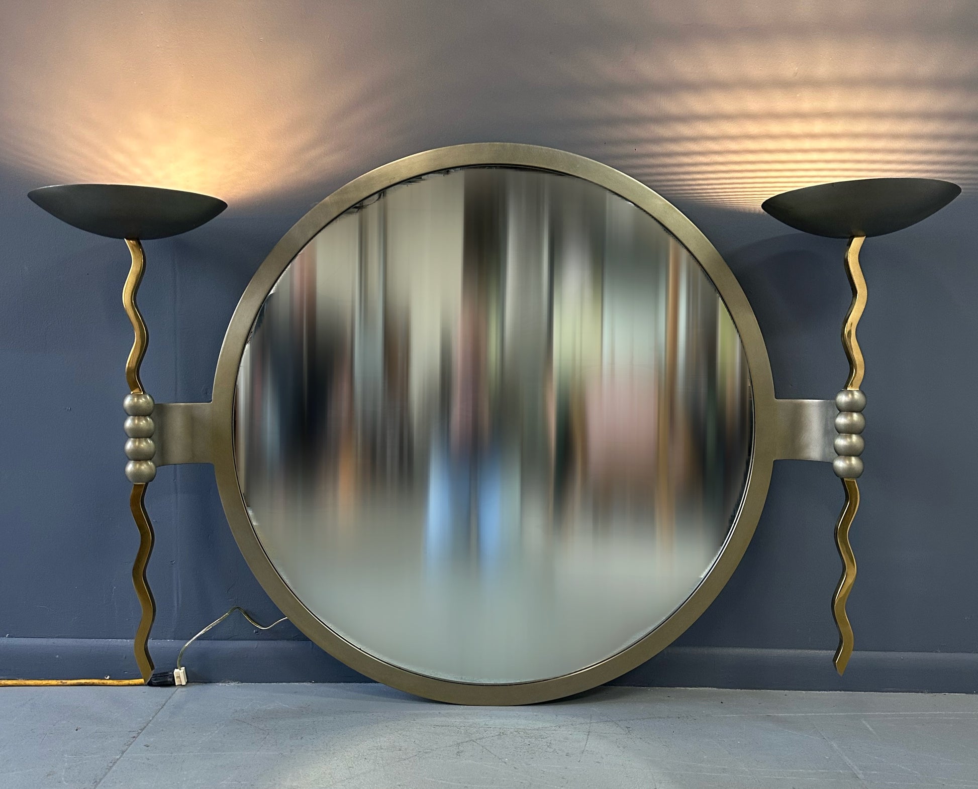 Brueton Large Postmodern 'Fist' Mirror Designed by Stanley Jay Friedman, Featuring Round Mirror with Sculptural Brass Candle Sconces