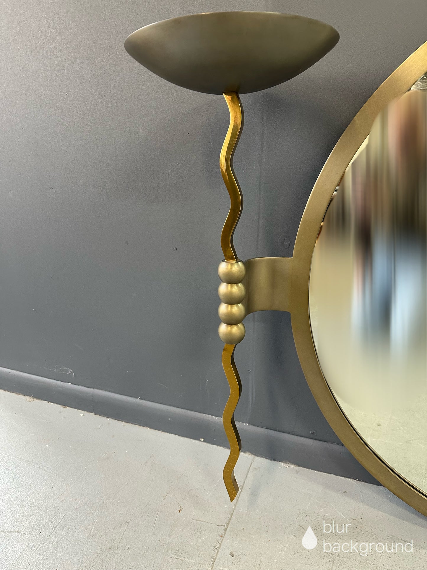 Brueton Large Postmodern 'Fist' Mirror Designed by Stanley Jay Friedman, Featuring Round Mirror with Sculptural Brass Candle Sconces