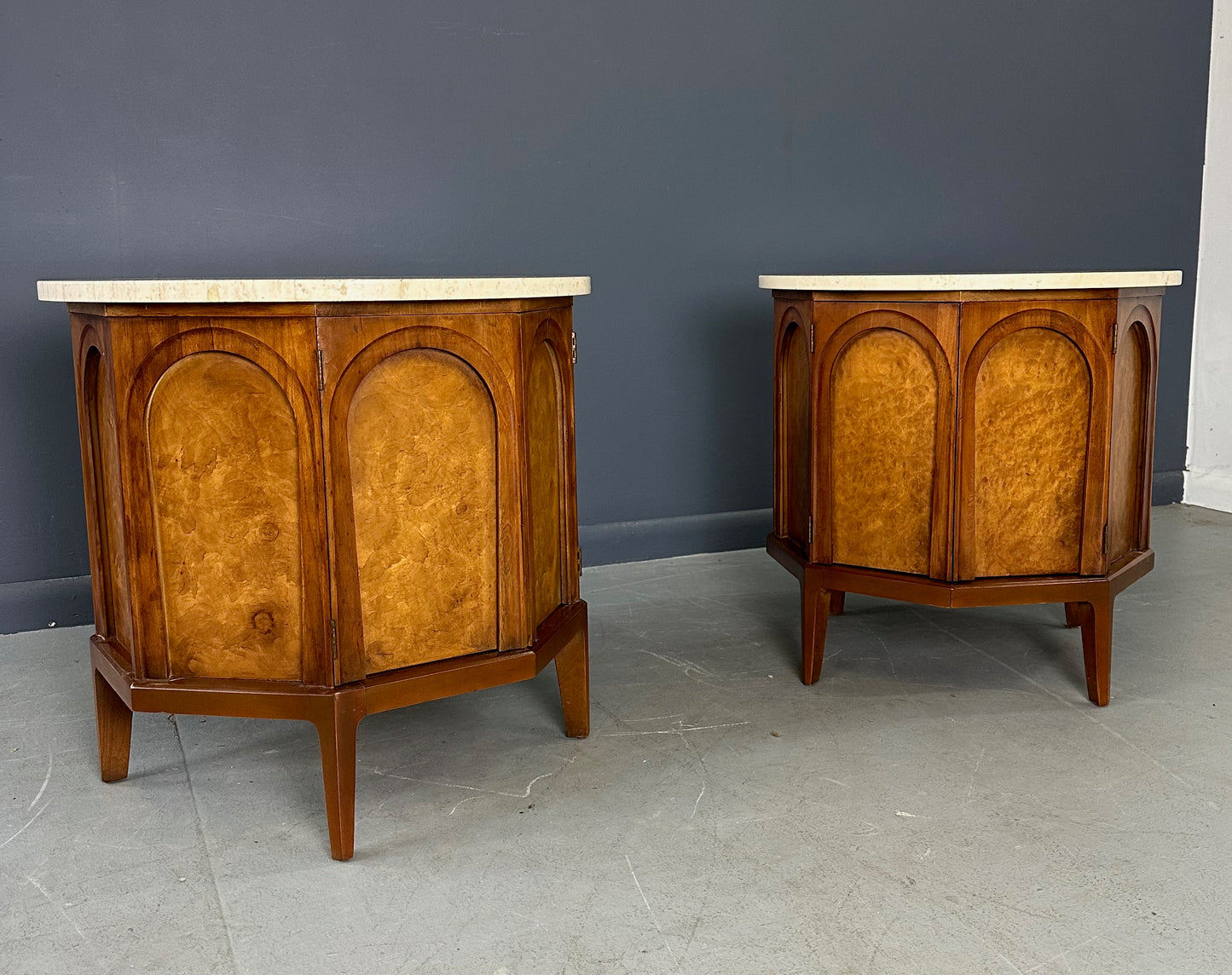 Pair of Thomasville 'Arched' Series End Tables or Nightstands Featuring Travertine Tops, Walnut Frames, and Olive Burl Panels
