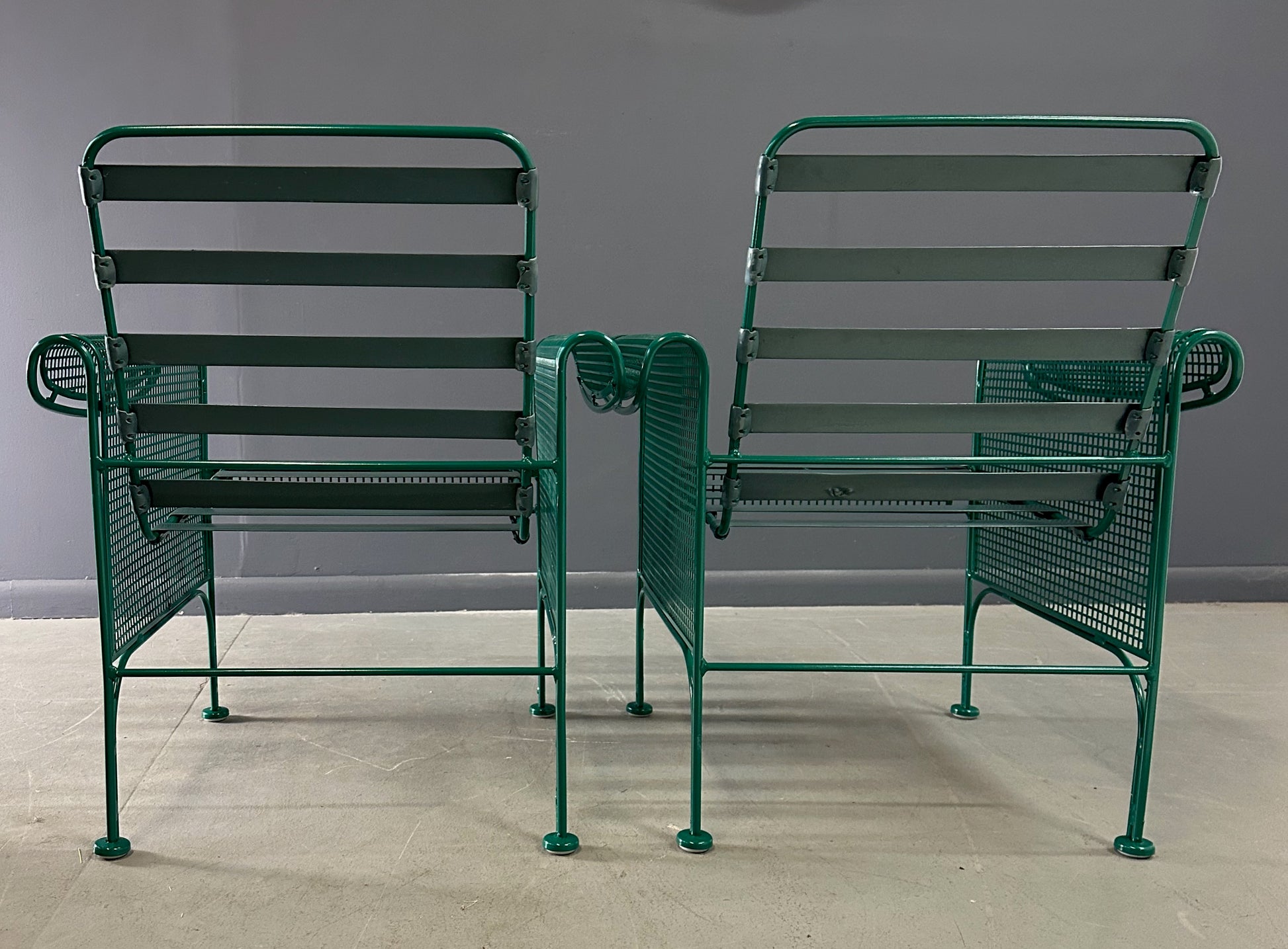 Pair of Vintage Green Metal Lounge Chairs by Woodard in the Style of Josef Hoffmann, Featuring Slatted Backs and Mesh Panels