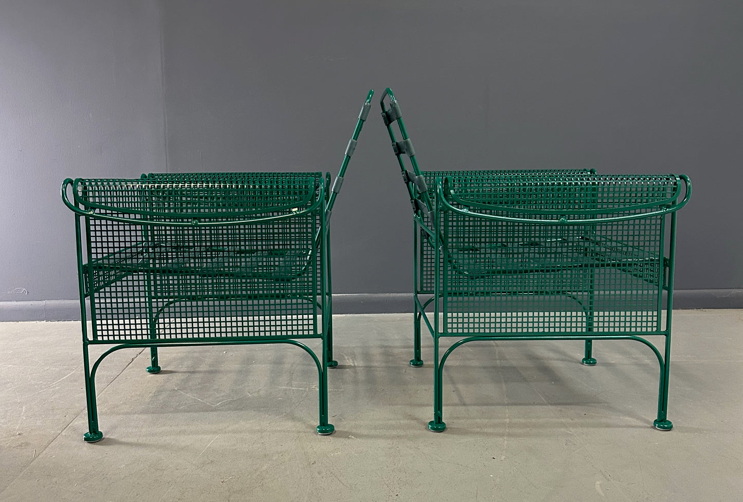 Pair of Vintage Green Metal Lounge Chairs by Woodard in the Style of Josef Hoffmann, Featuring Slatted Backs and Mesh Panels