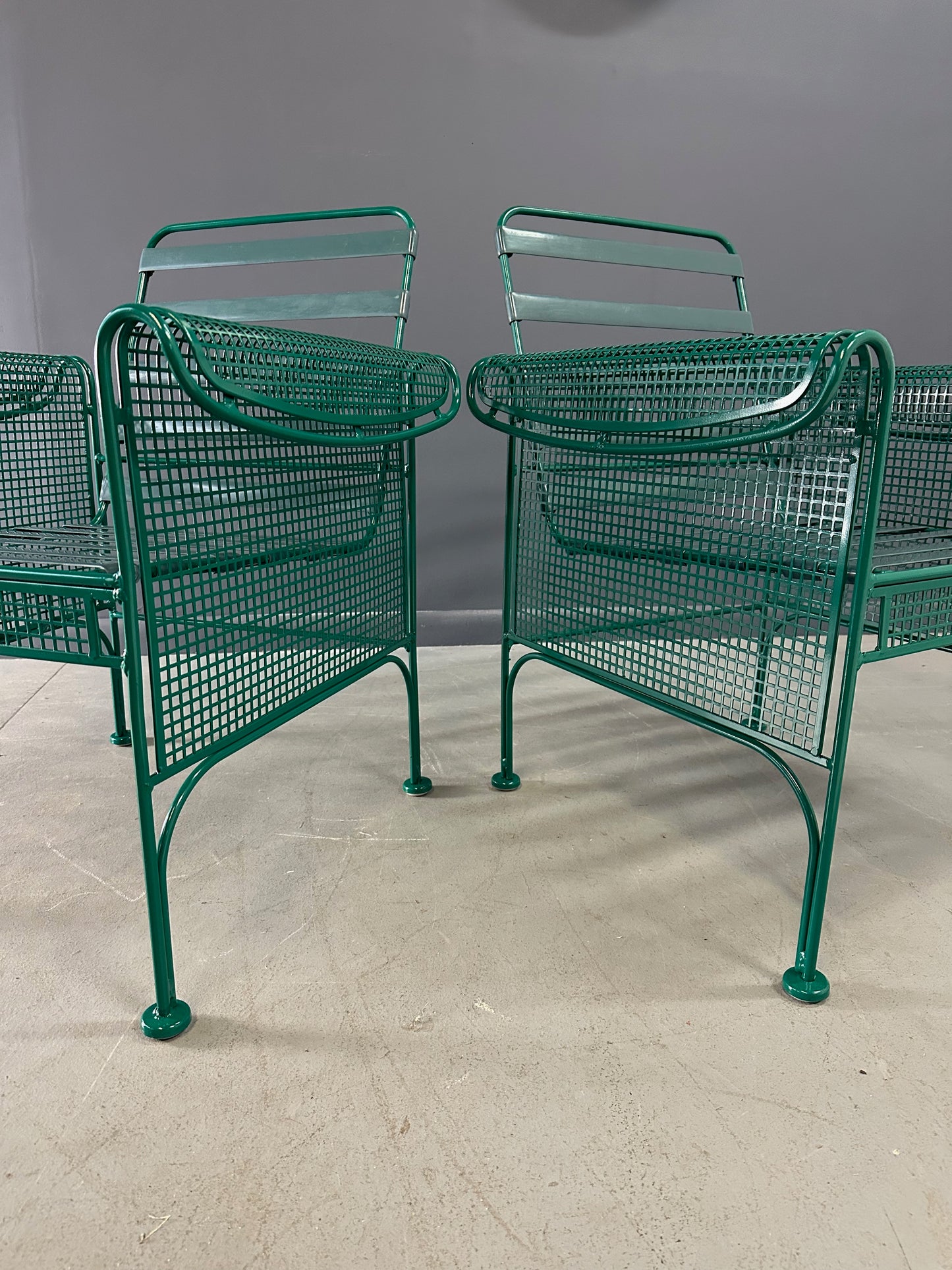 Pair of Vintage Green Metal Lounge Chairs by Woodard in the Style of Josef Hoffmann, Featuring Slatted Backs and Mesh Panels