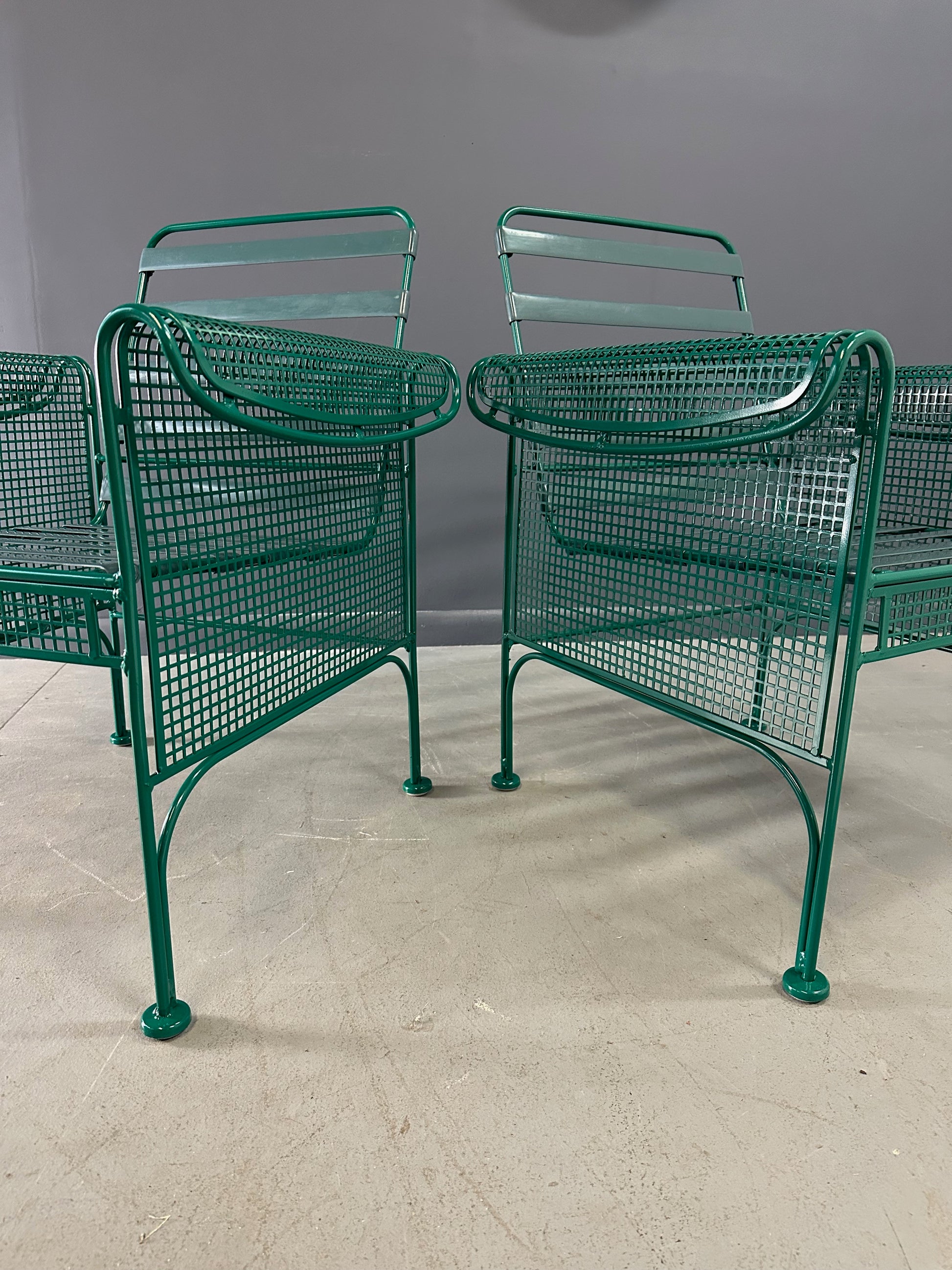 Pair of Vintage Green Metal Lounge Chairs by Woodard in the Style of Josef Hoffmann, Featuring Slatted Backs and Mesh Panels