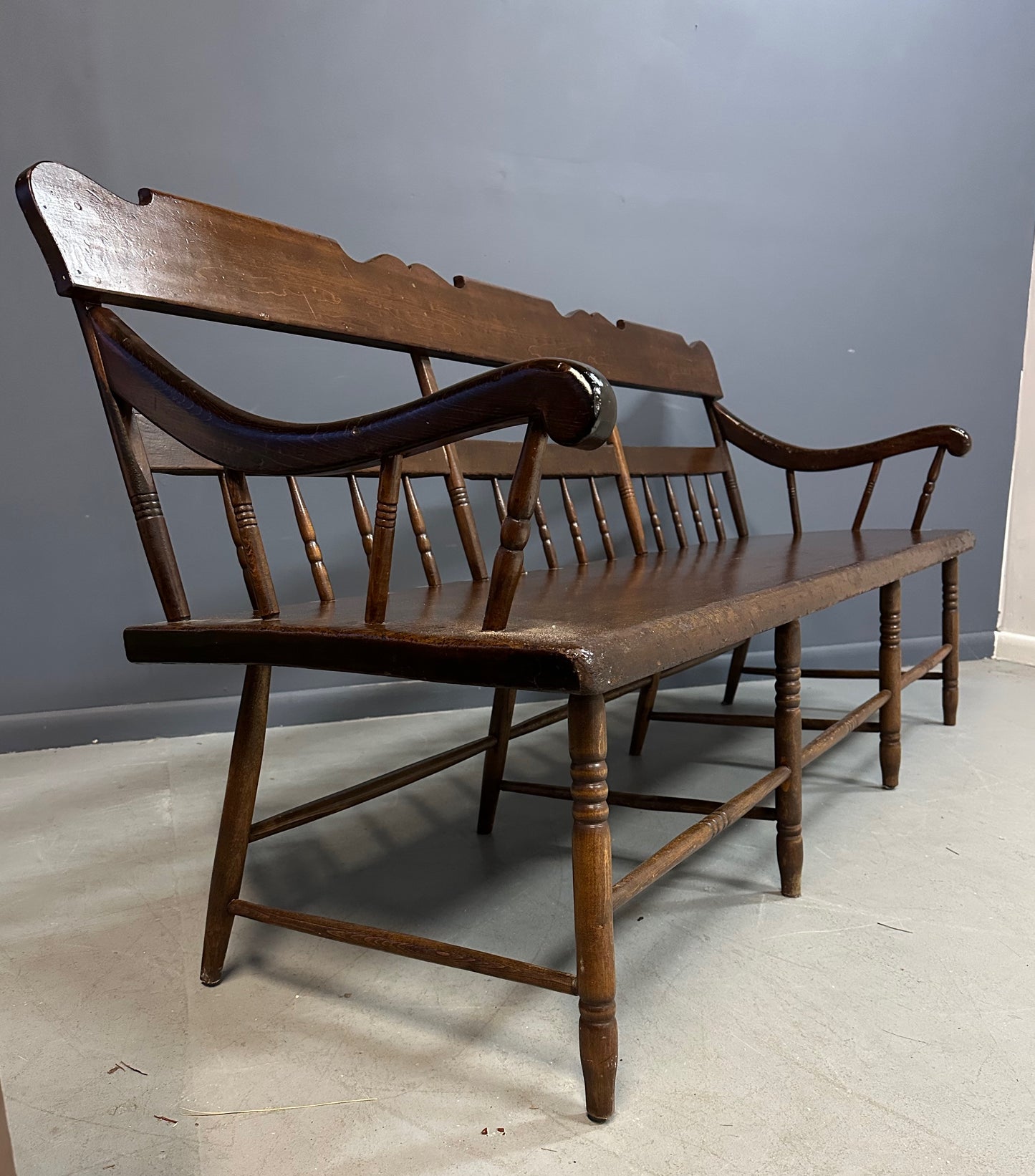 SOLD – Antique Dark Pine Rustic Spindle Back Deacon's Bench