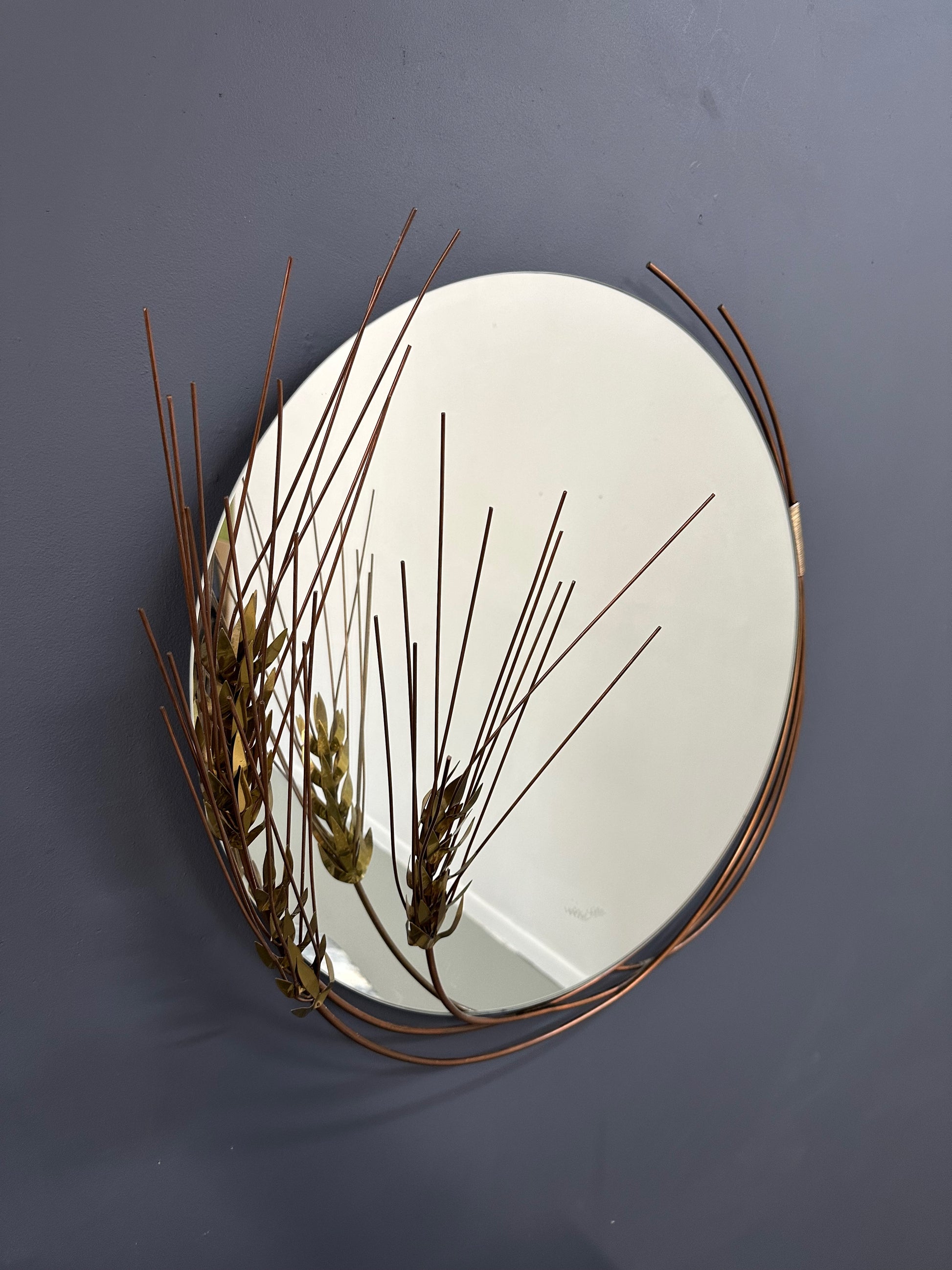Vintage 1981 Curtis Jere round wall mirror with brass wheat stalk design, mid-century modern decor
