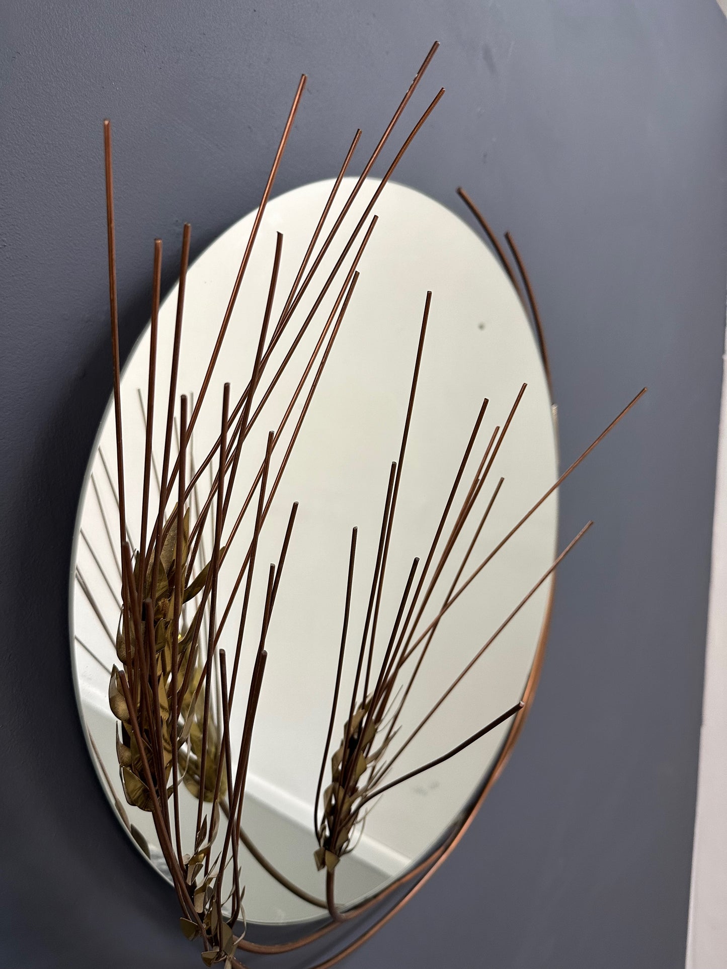 Vintage 1981 Curtis Jere round wall mirror with brass wheat stalk design, mid-century modern decor

